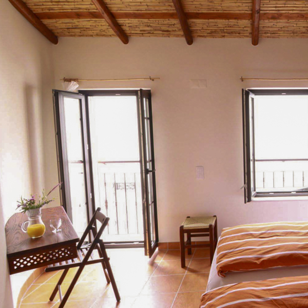 Private room with shared living areas at OÁSIS Ferragudo
